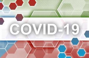 Equatorial Guinea flag and futuristic digital abstract composition with Covid-19 inscription. Coronavirus outbreak concept photo