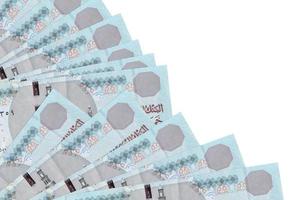 5 Egyptian pounds bills lies isolated on white background with copy space stacked in fan close up photo