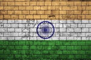 India flag is painted onto an old brick wall photo