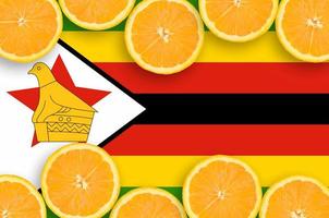 Zimbabwe flag in citrus fruit slices horizontal frame photo