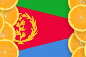 Eritrea flag in citrus fruit slices vertical frame photo