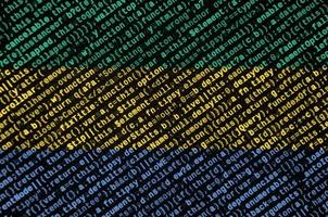 Gabon flag is depicted on the screen with the program code. The concept of modern technology and site development photo