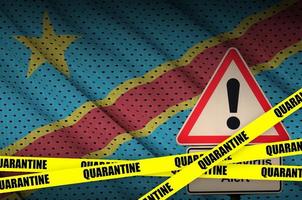 Democratic Republic of the Congo flag and Covid-19 quarantine yellow tape. Coronavirus or 2019-nCov virus photo