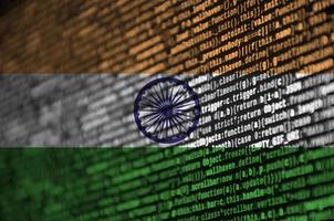 India flag is depicted on the screen with the program code. The concept of modern technology and site development photo