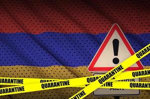 Armenia flag and Covid-19 quarantine yellow tape. Coronavirus or 2019-nCov virus photo