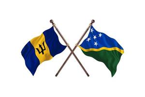 barbados versus islas salomón dos banderas de países foto