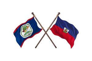 belice contra haití dos banderas de países foto