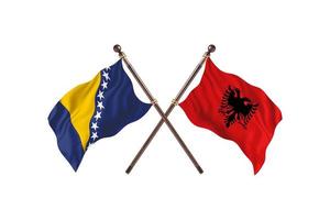 bosnia contra albania dos banderas de países foto