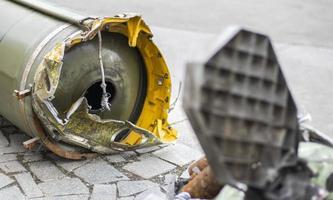 Parts of a tactical ballistic missile, OTR-21. Destroyed Russian military equipment. Spent projectile of the Soviet missile system of the divisional level Tochka U, SS-21 Scarab A, M-21. photo