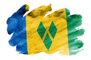 Saint Vincent and the Grenadines flag is depicted in liquid watercolor style isolated on white background photo