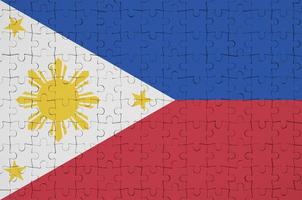 Philippines flag is depicted on a folded puzzle photo