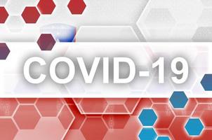 Slovenia flag and futuristic digital abstract composition with Covid-19 inscription. Coronavirus outbreak concept photo