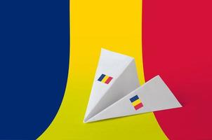 Chad flag depicted on paper origami airplane. Handmade arts concept photo