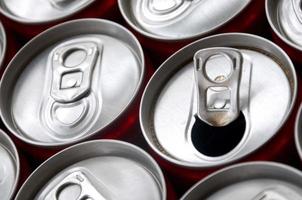 Many aluminium soda drink cans. Advertising for Soda drinks or tin cans mass manufacturing photo