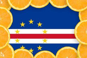 Cabo verde flag in fresh citrus fruit slices frame photo