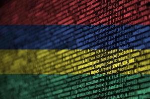 Mauritius flag is depicted on the screen with the program code. The concept of modern technology and site development photo