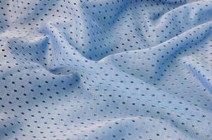 Blue mesh sport wear fabric textile background pattern photo
