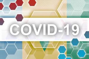 Saint Vincent and the Grenadines flag and futuristic digital abstract composition with Covid-19 inscription. Coronavirus outbreak concept photo