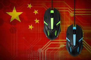 China flag and two mice with backlight. Online cooperative games. Cyber sport team photo