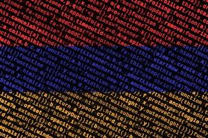 Armenia flag is depicted on the screen with the program code. The concept of modern technology and site development photo