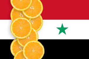 Syria flag and citrus fruit slices vertical row photo