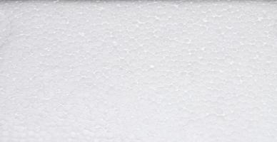 White polystyrene foam board, High quality styrofoam texture background, Close up of a porous white surface photo