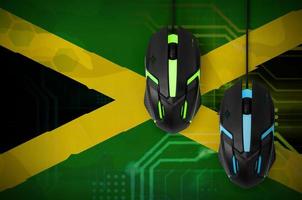 Jamaica flag and two mice with backlight. Online cooperative games. Cyber sport team photo