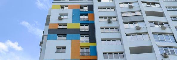 New multy storey residential building and blue sky photo