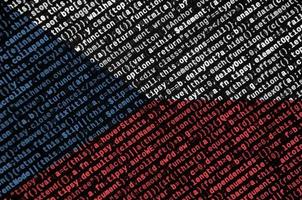 Czech flag is depicted on the screen with the program code. The concept of modern technology and site development photo