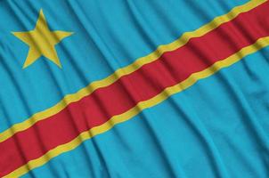 Democratic Republic of the Congo flag is depicted on a sports cloth fabric with many folds. Sport team banner photo