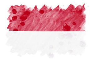 Indonesia flag is depicted in liquid watercolor style isolated on white background photo