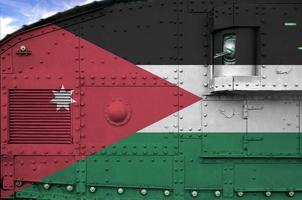 Jordan flag depicted on side part of military armored tank closeup. Army forces conceptual background photo