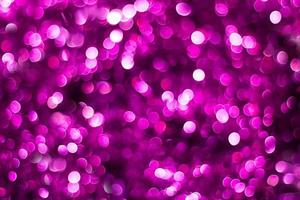 Purple shiny glitter holiday beautiful abstract blur bokeh background photo