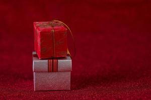 Red background image and gift box Valentine's Day concept photo