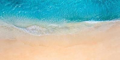 Summer panorama seascape landscape waves, blue sea water sunny day. Top view from drone. Sea aerial view, amazing tropical nature background. Beautiful Mediterranean waves surf splashing panorama photo