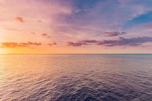 Closeup sea waves beach. Amazing beach landscape. Inspire tropical beach seascape horizon. Abstract golden sunset sky cloud tranquil relaxing sunlight summer freedom. Vacation travel nature background photo