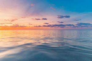 Closeup sea waves beach. Amazing beach landscape. Inspire tropical beach seascape horizon. Abstract golden sunset sky cloud tranquil relaxing sunlight summer freedom. Vacation travel nature background photo