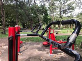 Old exercise equipment in the park area, free service for people. photo
