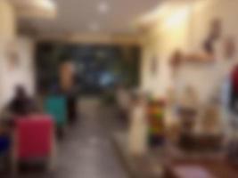 Defocused abstract background of The interior of a coffee shop with a brownish vintage feel photo