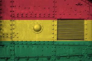 Bolivia flag depicted on side part of military armored tank closeup. Army forces conceptual background photo