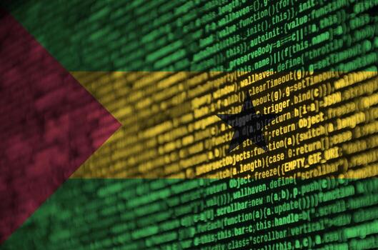 la bandera de santo tomé y príncipe se representa en la pantalla con el código del programa. el concepto de tecnología moderna y desarrollo de sitios foto