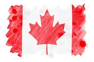 Canada flag is depicted in liquid watercolor style isolated on white background photo