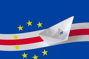 Cabo verde flag depicted on paper origami ship closeup. Handmade arts concept photo