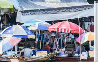 Environment, lifestyle, Amphawa Floating Market, Samut Songkhram, Thailand. Year 2020 photo