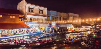 Environment, lifestyle, Amphawa Floating Market, Samut Songkhram, Thailand. Year 2020 photo