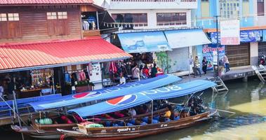 Environment, lifestyle, Amphawa Floating Market, Samut Songkhram, Thailand. Year 2020 photo