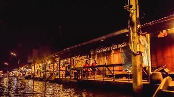 Environment, lifestyle, Amphawa Floating Market, Samut Songkhram, Thailand. Year 2020 photo