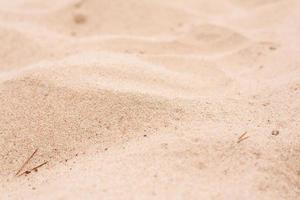 arena amarilla en un día de verano, en la playa. antecedentes. foto