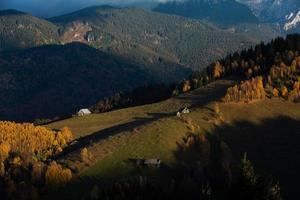 A charming mountain landscape in the Bucegi mountains, Carpathians, Romania. Autumn nature in Moeciu de Sus, Transylvania photo