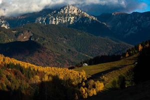 A charming mountain landscape in the Bucegi mountains, Carpathians, Romania. Autumn nature in Moeciu de Sus, Transylvania photo